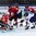 ZUG, SWITZERLAND - APRIL 17: Finland's Topi Piipponen #29 with a scoring chance against Switzerland's Joren van Pottelberghe #30 while Denis Malgin #13, Joonas Niemela #14 and Livio Stadler #4 look on during preliminary round action at the 2015 IIHF Ice Hockey U18 World Championship. (Photo by Francois Laplante/HHOF-IIHF Images)